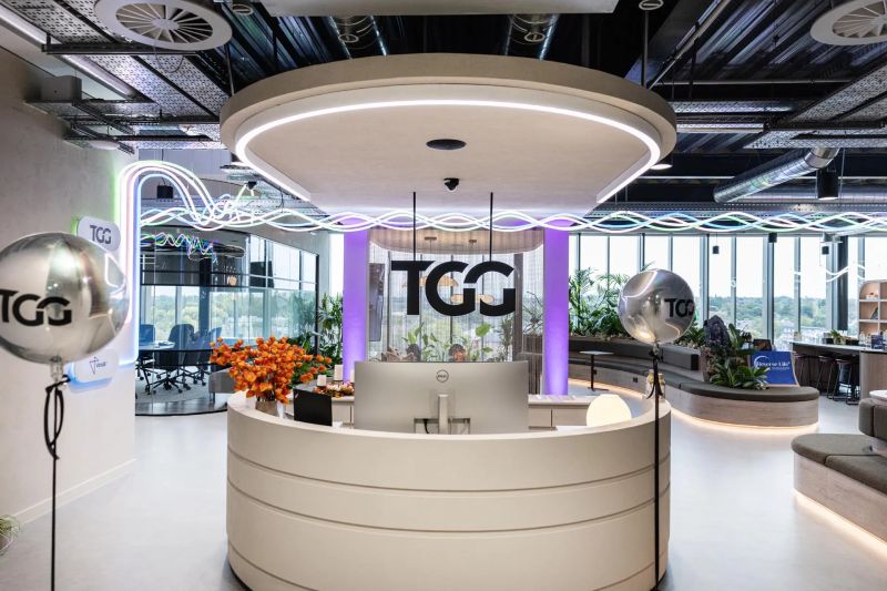 The Genius Group reception with TGG branding.